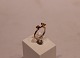 Gilded 925 
sterling silver 
ring with green 
stones by 
Christina 
Jewelry.
Size 57.
