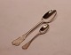 Dinner spoon 
and teaspoon in 
the Rosenborg 
pattern by A. 
Michelsen and 
made of 
three-towered 
...