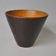 Aluminia vase, 
1460, 20th 
century, 
Copenhagen, 
Denmark. 
Conical shape. 
Exterior with 
reddish ...