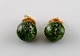 Danish 14K gold ear studs with green stones. Mid-1900s.
