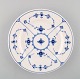 Two Royal Copenhagen Blue fluted lunch plates.

