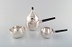 Henning Koppel. 
Coffee service 
in sterling 
silver 
consisting of 
coffee pot, 
cream pot and 
sugar ...