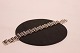 Bracelet of 830 
silver, stamped 
ThF by 
Frederiksen 
Viborg.
L - 19,5 cm 
and W - 1,5 cm.
