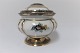 Royal 
Copenhagen. 
Bonbonniere 
porcelain lid 
with motif from 
Fredensborg 
Palace. 
Mounting of ...
