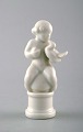 Rare Dahl Jensen figure. Blanc de chine. Child with bird. Model Number 1044.
