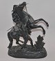 The horse man, 
sculpture, cast 
black zinc, 
19th century. 
Height: 40 cm. 
L. 31 cm.