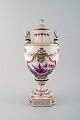 Antique lidded vase of porcelain in overglaze. Classic style. late 1800s.

