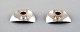 Model number 
1050.
Bent Knudsen 
(Denmark), a 
pair of danish 
modernist 
candlesticks in 
sterling ...
