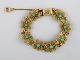 Bracelet in sterling silver, partially gilded, turquoise stones. Classic 
bracelet, ca. 1960.
