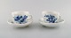 A pair of Meissen blue onion coffee cups and saucers.
