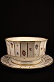 Large bowl with 
dish in 
"Henriette" by 
Royal 
Copenhagen.
Decoration 
number 444/8538 
- fad: ...