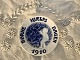 Royal 
Copenhagen, 
Children's help 
plate, 1910, 
Child and leaf 
hanging, 12.5cm 
in diameter, 
...
