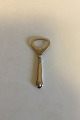Cohr Silver snd 
Stainless Steel 
Saxon Bottle 
Opener. 
Measures 10 cm 
/ 3 15/16 in.