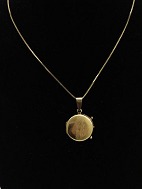 18 carat gold necklace and 14 carat medallion