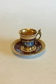 Royal 
Copenhagen 
Empire cup in 
Sevres style 
decorated with 
war chariots 
women's 
silhouette. 
From ...