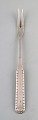 Georg Jensen 
Rope meat fork 
in silver. 
1920. Silver 
(830).
Measures 18.5 
cm.
In very good 
...