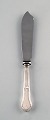 Danish 
silversmith. 
Rosenholm cake 
knife in silver 
(830). 1950.
In very good 
...