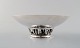 Georg Jensen 
compote in 
hammered 
sterling 
silver, model 
number 641B.
Designed by 
Ove Brøbech ...