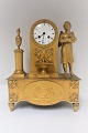 French gilded 
bronze clock. 
White dial. 
Height 36 cm. 
Produced 1810 - 
1830