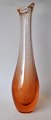 Lip vase, 
1960s. Sweden. 
Salmon colored. 
With air 
bubbles and 
tread pattern.  
Height: 33 ...