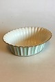 Royal 
Copenhagen 
Service with 
green 
decoration with 
gold on form 
507(Herregaard) 
Oval Bowl. ...