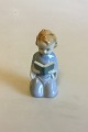 Ilmenau 
Figurine of 
Girl with Book. 
Measures 9 cm / 
3 35/64 in.