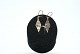 Brick Earrings 
in 14k Gold 
(Hanger) 9rk
Stamp: BNH 585
Height 4.2 cm
Wide 0.9 cm
Checked ...