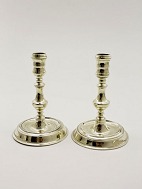 A pair of næstved brass candlesticks