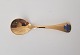 Georg Jensen. 
Annual Spoon - 
1990
Gilded 
Sterling Silver 
925 S with 
enamel.
Length 15 cm.