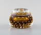 Murano, amber colored candle holder in mouth blown art glass, 1960s.