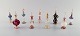 Large 
collection of 
Italian flacons 
in mouth blown 
art glass. 
Partially 
colored glass 
decorated ...