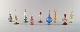 Large 
collection of 
Italian flacons 
in mouth blown 
art glass. 
Partially 
colored glass 
decorated ...