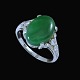 Platinum 
Cocktail Ring 
with Oval Jade 
and Diamonds.
Two Brillant 
Cut diamonds 
0,05ct. Total 
...