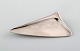 Henning Koppel 
for Georg 
Jensen. 
Modernist 
brooch in 
sterling 
silver. Design 
number ...