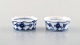 A pair of Royal Copenhagen Blue Fluted plain salt jars # 1/199.
