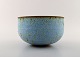 Helle Allpass (1932-2000). Large Bowl of glazed stoneware in beautiful turquoise 
glaze with iron spots. 1960 / 70
