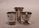 Different 
eggcups all in 
hallmarked 
silver with 
different 
motives.
1)6,5x5 cm.
2)5x4,5 ...