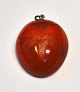 Amber pendant, 
polished amber 
with decoration 
of starfish, 
20th century L: 
3.5 cm.
