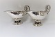 Georg Jensen. 
Sterling (925). 
A pair of sauce 
bowls with 
grapes. Design 
296A. Length 24 
cm. ...