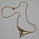 Sterling silver 
chain with 
pearl, 20th 
century 
Denmark. 
Stamped. L: 42 
cm.