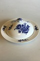 Royal 
Copenhagen Blue 
Flower Braided 
Lidded Bowl . 
Measures 14 cm 
/ 5 33/64 in. x 
30.5 cm / 12 
...