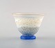 Ulrica Hydman Vallien for Kosta Boda, Sweden. Vase on foot in light blue and 
clear mouth blown art glass. Swedish design 1980