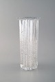 Willy Johansson for Hadeland, Norway. Ribbed "Atlantic" vase in clear art glass 
with bubbles.
