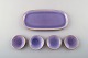 Louise Adelborg (b.1885, 1971) for Rörstrand / Rorstrand, Sweden. Set of one 
long and four small Swedish Grace dishes in purple with gold decoration. 1930 / 
40