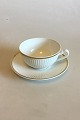 Royal 
Copenhagen 
Tunna Tea Cup 
and Saucer No 
1277/9957. 
Measures 5.6 cm 
/ 2 13/64 in. x 
10.5 cm ...