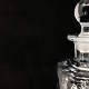 Height 23 cm.
Kluk flask in 
clear glass 
with round 
stopper from 
Holmegaard.
The flask is 
one ...