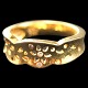 Ole Lynggaard gold jewellery.Charlotte Lynggard for Ole Lynggaard; Lace ring with three ...