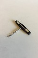 Hans Hansen 
Rosewood with 
Silver 
Corkscrew. 
Measures 10 cm 
3 15/16 in.