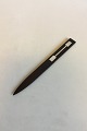 Hans Hansen 
Rosewood with 
Silver Letter 
Opener. 
Measures 23 cm 
/ 9 1/16 in.