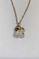 Georg Jensen 
(Royal 
Copenhagen) 
Sterling 
Silver(Gilded)Necklace 
with Porcelain 
Pendant No 239  
L ...